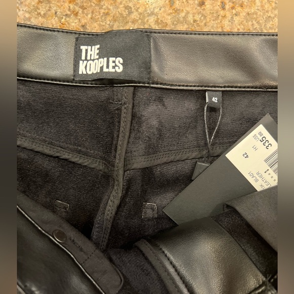 The Kooples
Coated Faux Leather Straight Leg Pants Size FR 42/ US 10 & 38/ 6 NWT - Picture 10 of 14